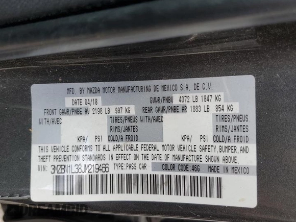 2018 Mazda 3 Touring z VIN 3MZBN1L38JM219466, wystawiony jako Copart lot #56766025 z przebiegiem 124 775 mil mil oraz Szkoda całkowita • Salvage title. Historia ofert i sprzedaży dostępna na DreamBid. Obrazek 12.