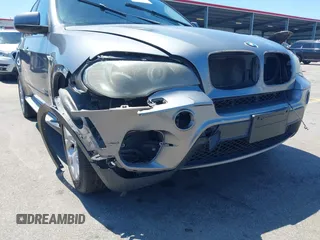 2011 BMW X5 35i z VIN 5UXZV4C57BL410981, wystawiony jako IAAI lot #42126240 z przebiegiem 160 473 mil mil oraz . Historia ofert i sprzedaży dostępna na DreamBid. Obrazek 6.