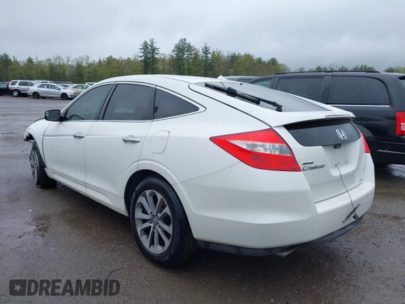 2010 Honda Crosstour EX-L z VIN 5J6TF2H55AL010444, wystawiony jako IAAI lot #42187788 z przebiegiem 217 940 mil mil oraz . Historia ofert i sprzedaży dostępna na DreamBid. Obrazek 3.