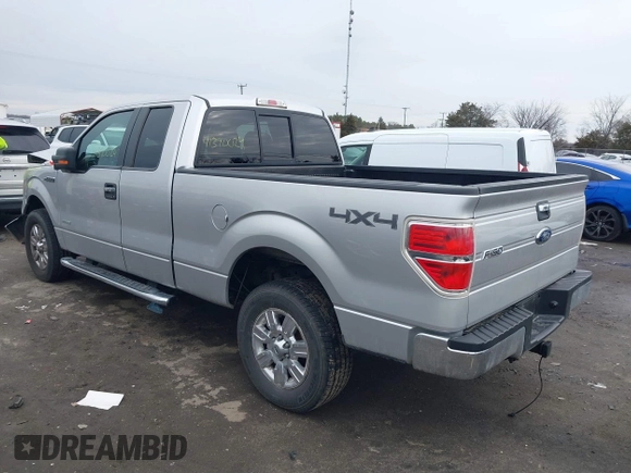 2014 Ford F-150 XL with VIN 1FTFX1ET3EFC39285, listed as a IAAI auction lot 41390024 with 217,856 mi miles. Bid and sale history available at carsss.com. Image 3.