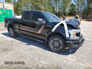 2018 Ford F-150 XL with VIN 1FTEX1C58JFC22654, listed as a Copart auction lot 47610705 with 118,361 mi miles and Salvage Title. Bid and sale history available at carsss.com. Image 4.