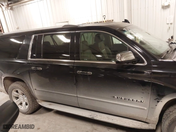 2017 Chevrolet Suburban Premier with VIN 1GNSKJKC0HR250854, listed as a IAAI auction lot 41541476 with 128,231 mi miles. Bid and sale history available at carsss.com. Image 13.