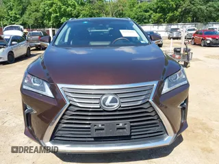 2016 Lexus RX 350 with VIN 2T2ZZMCA3GC005018, listed as a IAAI auction lot 42276197 with 136,692 mi miles and . Bid and sale history available at DreamBid. Image 13.