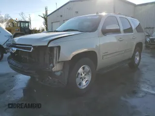 2012 Chevrolet Tahoe LS with VIN 1GNSCAE02CR260728, listed as a Copart auction lot 87588665 with 244,107 mi miles and Salvage title. Bid and sale history available at DreamBid. Image 1.