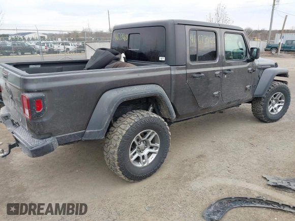 2020 Jeep Gladiator Sport S with VIN 1C6HJTAG8LL141535, listed as a IAAI auction lot 41673860 with 67,160 mi miles. Bid and sale history available at carsss.com. Image 4.
