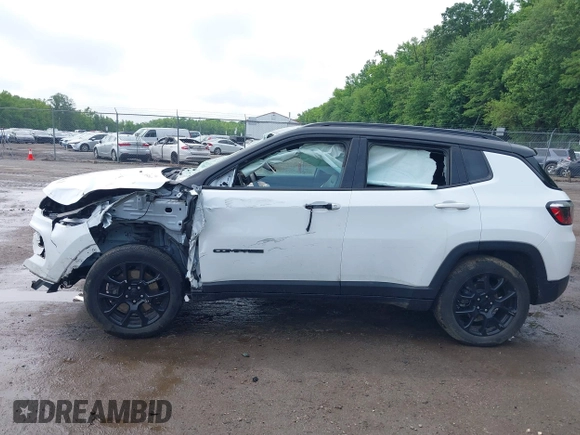 2023 Jeep Compass Latitude with VIN 3C4NJDBN3PT510424, listed as a IAAI auction lot 42385491 with 58,640 mi miles and . Bid and sale history available at DreamBid. Image 14.