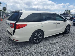 2018 Honda Odyssey Elite z VIN 5FNRL6H9XJB064148, wystawiony jako Copart lot #56214025 z przebiegiem 117 627 mil mil oraz Szkoda całkowita • Salvage title. Historia ofert i sprzedaży dostępna na DreamBid. Obrazek 3.