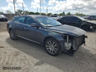 2014 Kia Cadenza Premium with VIN KNALN4D79E5134770, listed as a Copart auction lot 73569374 with 141,599 mi miles and Salvage Title. Bid and sale history available at carsss.com. Image 4.