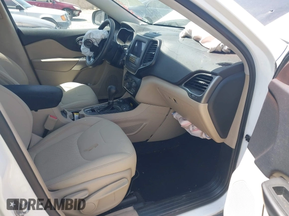 2019 Jeep Cherokee Latitude z VIN 1C4PJMCB0KD161976, wystawiony jako IAAI lot #42510314 z przebiegiem 256 990 mil mil oraz . Historia ofert i sprzedaży dostępna na DreamBid. Obrazek 5.