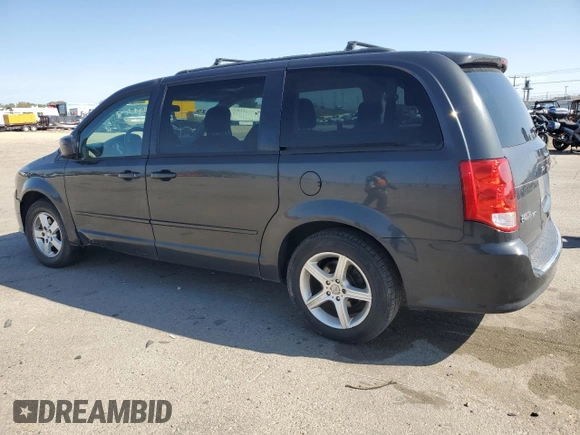 2012 Dodge Grand Caravan SXT with VIN 2C4RDGCG8CR204035, listed as a Copart auction lot 54743005 with 187,533 mi miles and Clean Title. Bid and sale history available at DreamBid. Image 2.