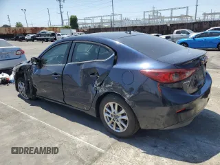 2015 Mazda 3 i Grand Touring with VIN 3MZBM1W7XFM135576, listed as a Copart auction lot 54060755 with 137,374 mi miles and Salvage title. Bid and sale history available at DreamBid. Image 2.