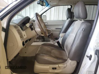 2008 Mercury Mariner Premier z VIN 4M2CU97188KJ23673, wystawiony jako Copart lot #64282185 z przebiegiem 198 511 mil mil oraz Szkoda całkowita • Salvage title. Historia ofert i sprzedaży dostępna na DreamBid. Obrazek 7.