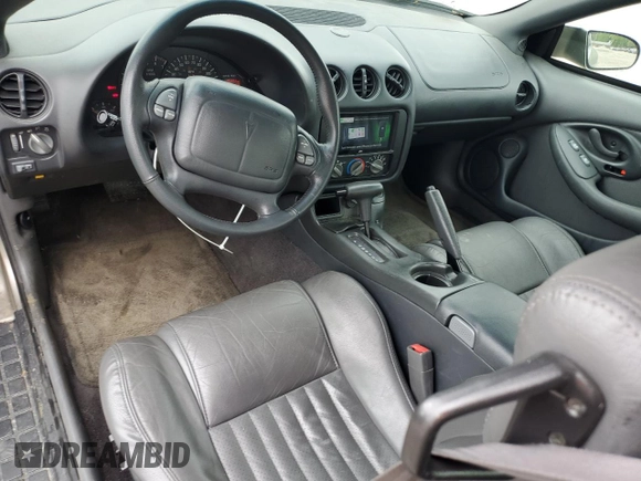 1999 Pontiac Firebird Firebird with VIN 2G2FS22K1X2209517, listed as a Copart auction lot 57304765 with 86,094 mi miles and Clean title. Bid and sale history available at DreamBid. Image 8.