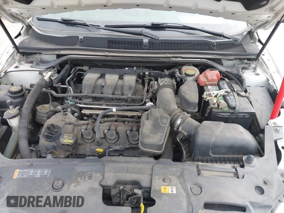 2013 Ford Taurus SEL with VIN 1FAHP2E87DG111530, listed as a IAAI auction lot 41322957 with 183,103 mi miles. Bid and sale history available at carsss.com. Image 10.