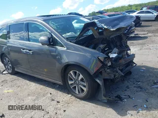2015 Honda Odyssey Touring Elite with VIN 5FNRL5H96FB065413, listed as a IAAI auction lot 42330462 with Not provided miles and . Bid and sale history available at DreamBid. Image 1.