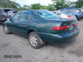 1999 Toyota Camry LE z VIN JT2BF22K2X0164080, wystawiony jako IAAI lot #40984874 z przebiegiem Nie podano mil oraz . Historia ofert i sprzedaży dostępna na DreamBid. Obrazek 3.