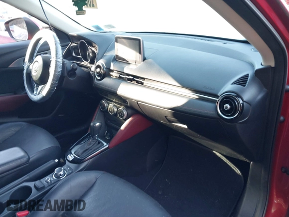 2017 Mazda CX-3 Grand Touring with VIN JM1DKFD77H0165528, listed as a IAAI auction lot 40942595 with 89,648 mi miles. Bid and sale history available at carsss.com. Image 5.