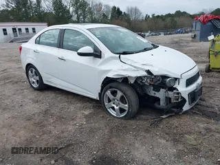 2012 Chevrolet Sonic LTZ z VIN 1G1JE5SB8C4229775, wystawiony jako IAAI lot #41522590 z przebiegiem 112 584 mil mil oraz . Historia ofert i sprzedaży dostępna na DreamBid. Obrazek 1.