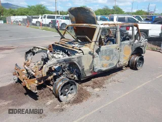 2015 Jeep Wrangler Unlimited Willys Wheeler with VIN 1C4BJWDG0FL751574, listed as a IAAI auction lot 41604064 with Not Provided miles and . Bid and sale history available at DreamBid. Image 2.