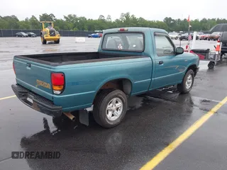 1994 Mazda B-Series Truck z VIN 4F4CR12A9RTM90195, wystawiony jako IAAI lot #42341674 z przebiegiem 120 646 mil mil oraz . Historia ofert i sprzedaży dostępna na DreamBid. Obrazek 4.