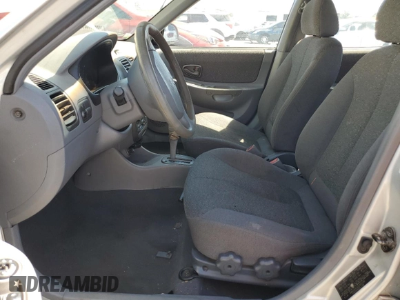 2002 Hyundai Accent GL with VIN KMHCG45C92U353198, listed as a Copart auction lot 68305654 with 130,594 mi miles and Clean Title. Bid and sale history available at carsss.com. Image 7.