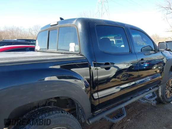 2012 Toyota Tacoma PreRunner z VIN 3TMJU4GN7CM128397, wystawiony jako IAAI lot #41676286 z przebiegiem 148 113 mil mil oraz . Historia ofert i sprzedaży dostępna na DreamBid. Obrazek 13.