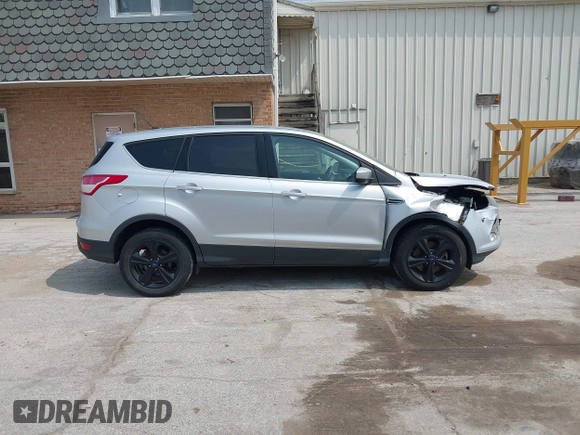2014 Ford Escape SE with VIN 1FMCU9GX9EUD83148, listed as a IAAI auction lot 42449815 with 120,062 mi miles and . Bid and sale history available at DreamBid. Image 13.
