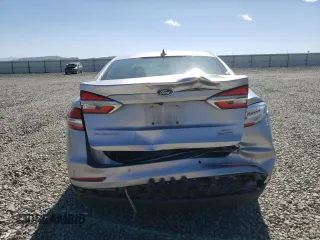 2020 Ford Fusion SE z VIN 3FA6P0LU3LR267311, wystawiony jako Copart lot #56350115 z przebiegiem 53 359 mil mil oraz Szkoda całkowita • Salvage title. Historia ofert i sprzedaży dostępna na DreamBid. Obrazek 6.