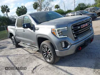 2021 GMC Sierra 1500 AT4 with VIN 1GTU9EET8MZ271591, listed as a IAAI auction lot 41566653 with 49,923 mi miles. Bid and sale history available at carsss.com. Image 1.