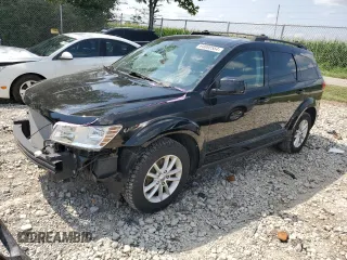 2015 Dodge Journey SXT with VIN 3C4PDCCG4FT697505, listed as a Copart auction lot 64888554 with 191,653 mi miles and Salvage title. Bid and sale history available at DreamBid. Image 1.