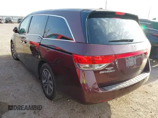 2015 Honda Odyssey Touring Elite with VIN 5FNRL5H98FB111226, listed as a IAAI auction lot 42136888 with 60,266 mi miles and . Bid and sale history available at DreamBid. Image 3.