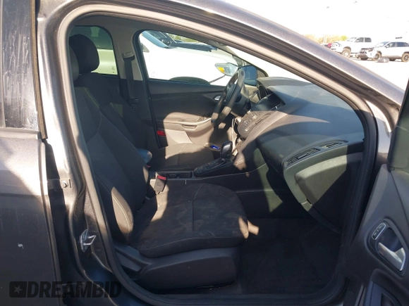 2018 Ford Focus SE with VIN 1FADP3F2XJL302358, listed as a IAAI auction lot 41807622 with 76,145 mi miles. Bid and sale history available at carsss.com. Image 5.