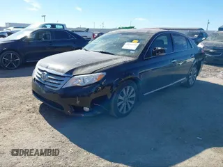 2012 Toyota Avalon with VIN 4T1BK3DB4CU442885, listed as a IAAI auction lot 40713053 with 144,383 mi miles and . Bid and sale history available at DreamBid. Image 2.