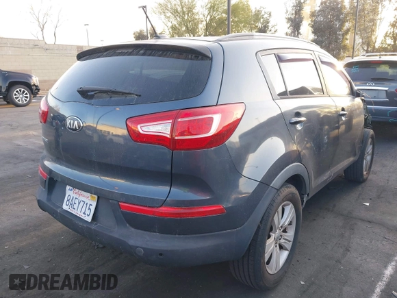 2013 Kia Sportage LX with VIN KNDPB3A24D7478526, listed as a IAAI auction lot 41943076 with 106,109 mi miles and . Bid and sale history available at carsss.com. Image 4.