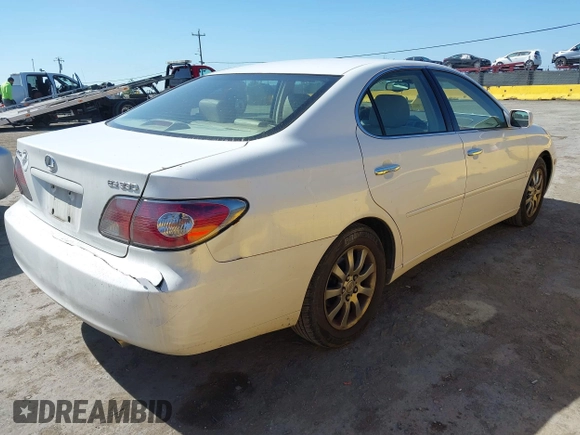 2004 Lexus ES 330 with VIN JTHBA30G645028767, listed as a IAAI auction lot 42150538 with 163,449 mi miles. Bid and sale history available at carsss.com. Image 4.