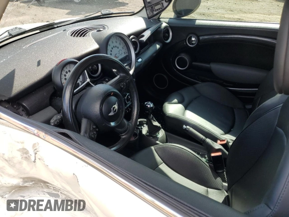 2011 MINI Hardtop S with VIN WMWSV3C59BTY23205, listed as a Copart auction lot 48672675 with 120,457 mi miles and Salvage Title. Bid and sale history available at DreamBid. Image 8.