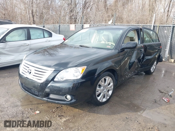 2010 Toyota Avalon XL with VIN 4T1BK3DBXAU357773, listed as a IAAI auction lot 41228045 with 127,403 mi miles and . Bid and sale history available at carsss.com. Image 17.