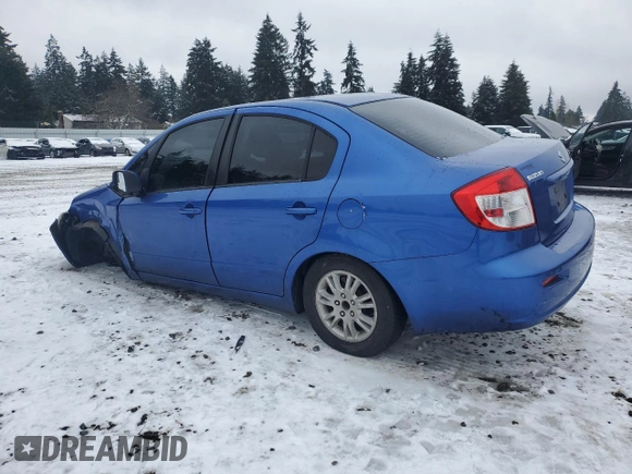 2012 Suzuki SX4 LE z VIN JS2YC5A30C6305375, wystawiony jako Copart lot #45429185 z przebiegiem 103 283 mil mil oraz Szkoda całkowita • Salvage title. Historia ofert i sprzedaży dostępna na DreamBid. Obrazek 2.
