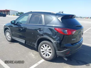 2014 Mazda CX-5 Sport z VIN JM3KE2BE8E0371775, wystawiony jako IAAI lot #42111417 z przebiegiem 150 932 mil mil oraz . Historia ofert i sprzedaży dostępna na DreamBid. Obrazek 3.