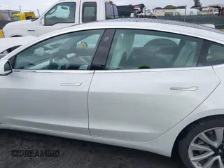 2020 Tesla Model 3 Standard Range Plus with VIN 5YJ3E1EA0LF741311, listed as a IAAI auction lot 41581931 with 43,284 mi miles. Bid and sale history available at carsss.com. Image 14.