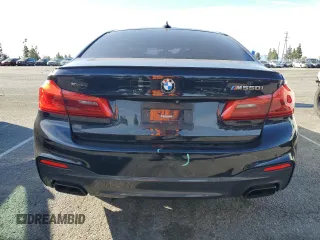 2020 BMW 5 Series M550i xDrive with VIN WBAJS7C06LBN96210, listed as a Copart auction lot 46769365 with 39,710 mi miles and Salvage title. Bid and sale history available at DreamBid. Image 6.