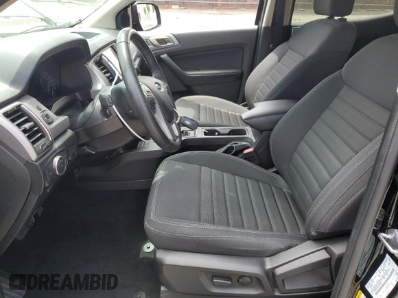 2023 Ford Ranger XL with VIN 1FTER4EH4PLE04252, listed as a Copart auction lot 58993055 with 20,307 mi miles and Salvage title. Bid and sale history available at DreamBid. Image 7.