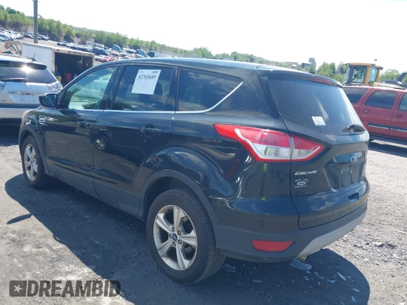2014 Ford Escape SE with VIN 1FMCU9GX9EUA18422, listed as a IAAI auction lot 42765689 with 153,235 mi miles and . Bid and sale history available at DreamBid. Image 3.