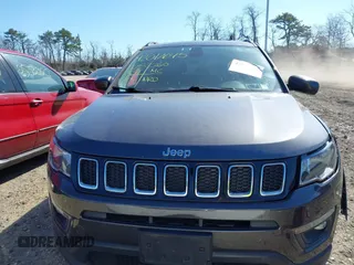 2018 Jeep Compass Altitude with VIN 3C4NJDBBXJT202826, listed as a IAAI auction lot 42012645 with 125,839 mi miles and . Bid and sale history available at carsss.com. Image 12.