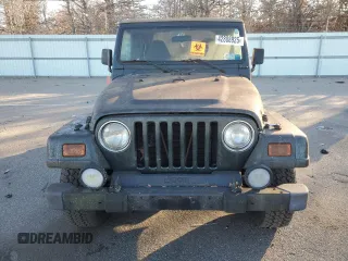 2002 Jeep Wrangler Sahara z VIN 1J4FA59S12P757177, wystawiony jako Copart lot #42808925 z przebiegiem 71 049 mil mil oraz Czysty tytuł • Clean title. Historia ofert i sprzedaży dostępna na DreamBid. Obrazek 5.