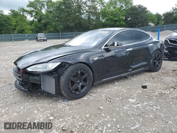 2014 Tesla Model S 60 with VIN 5YJSA1H11EFP65266, listed as a Copart auction lot 60934805 with 93,546 mi miles and Salvage title. Bid and sale history available at DreamBid. Image 1.