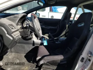 2016 Subaru WRX STI z VIN JF1VA2M64G9809798, wystawiony jako Copart lot #87480534 z przebiegiem 59 136 mil mil oraz Szkoda całkowita • Salvage title. Historia ofert i sprzedaży dostępna na DreamBid. Obrazek 7.