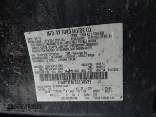 2014 Ford Taurus Limited with VIN 1FAHP2F87EG130532, listed as a IAAI auction lot 41618112 with 118,474 mi miles. Bid and sale history available at carsss.com. Image 9.