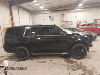 2016 GMC Yukon SLE with VIN 1GKS2AKC1GR276262, listed as a IAAI auction lot 41336378 with 213,182 mi miles. Bid and sale history available at carsss.com. Image 13.