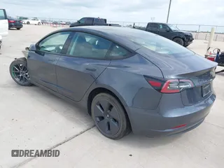 2023 Tesla Model 3 with VIN 5YJ3E1EA7PF417293, listed as a IAAI auction lot 42407659 with 22,578 mi miles and . Bid and sale history available at DreamBid. Image 3.